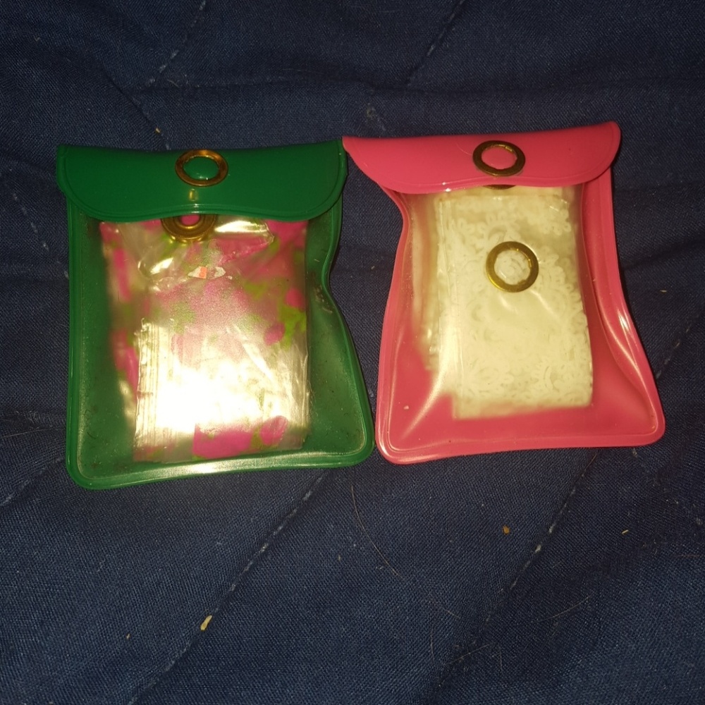 Set of two vintage reusable rain bonnets in plasti